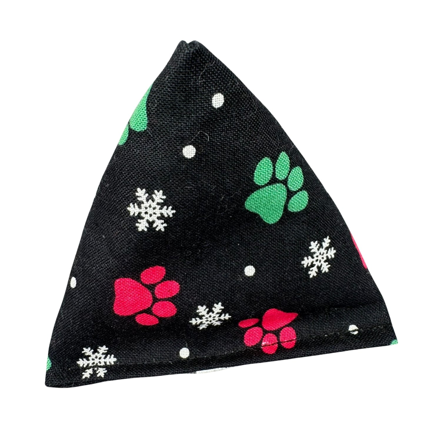 Paw Prints and Snowflakes | Happy Sack Catnip Cat Toy from CatnipTakeout - A toy with a black background featuring red and green paw prints and white snowflakes, perfect for festive playtime.