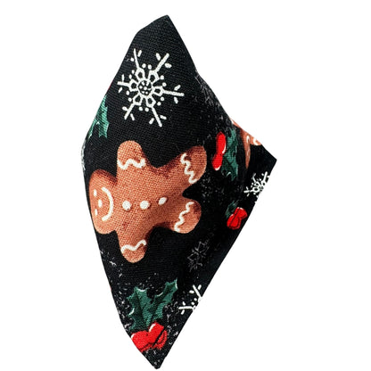 Gingerbread and Snowflakes | Happy Sack Catnip Cat Toy from CatnipTakeout - A toy featuring gingerbread and snowflakes on a black background, perfect for festive playtime