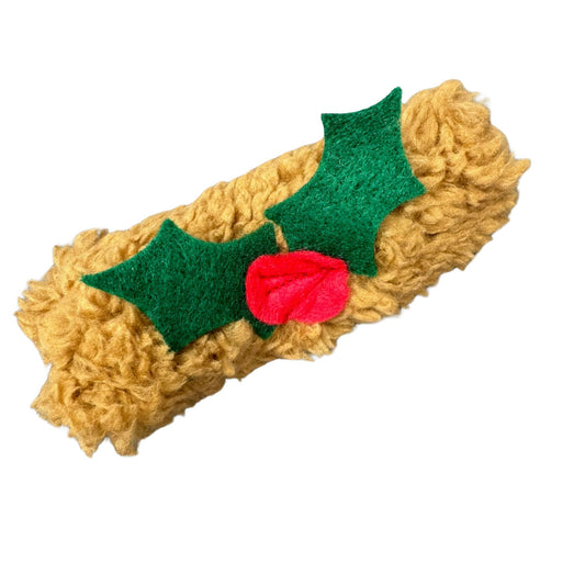 Yule Log Catnip Cat Toy from CatnipTakeout - A fuzzy felt toy shaped like a traditional yule log in brown, decorated with vibrant green holly and red berries, perfect for holiday-themed playtime.