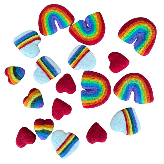 Group of felt catnip toys featuring colorful rainbows and hearts, perfect for playful cats.