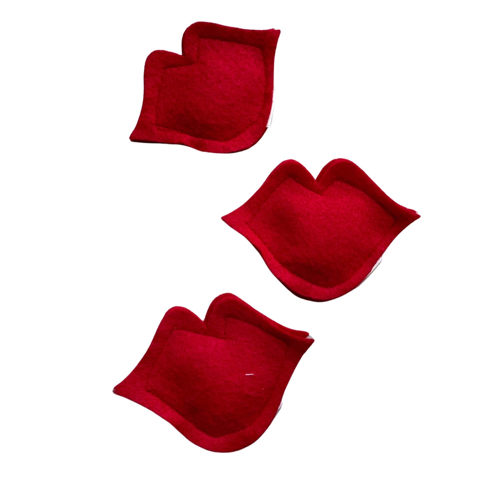 Three red lips catnip toys shown in various angles, highlighting the plush felt material and playful design for cat made by CatnipTakeout.