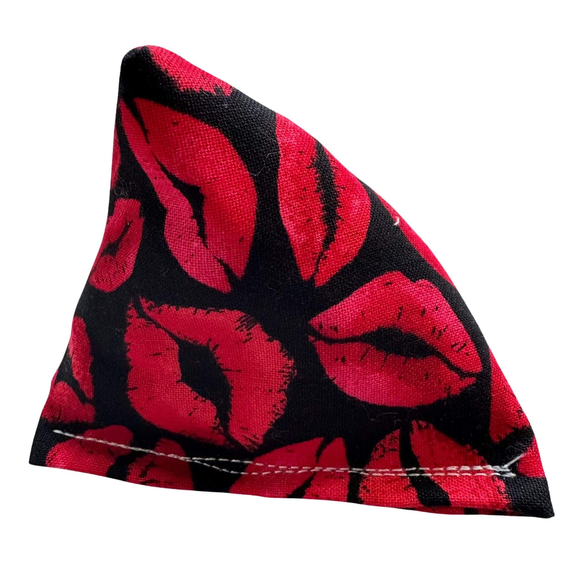 Red Lips Happy Sack Cat Toy featuring a bold red lips pattern on a black fabric, filled with catnip for engaging feline playtime made by CatnipTakeout.