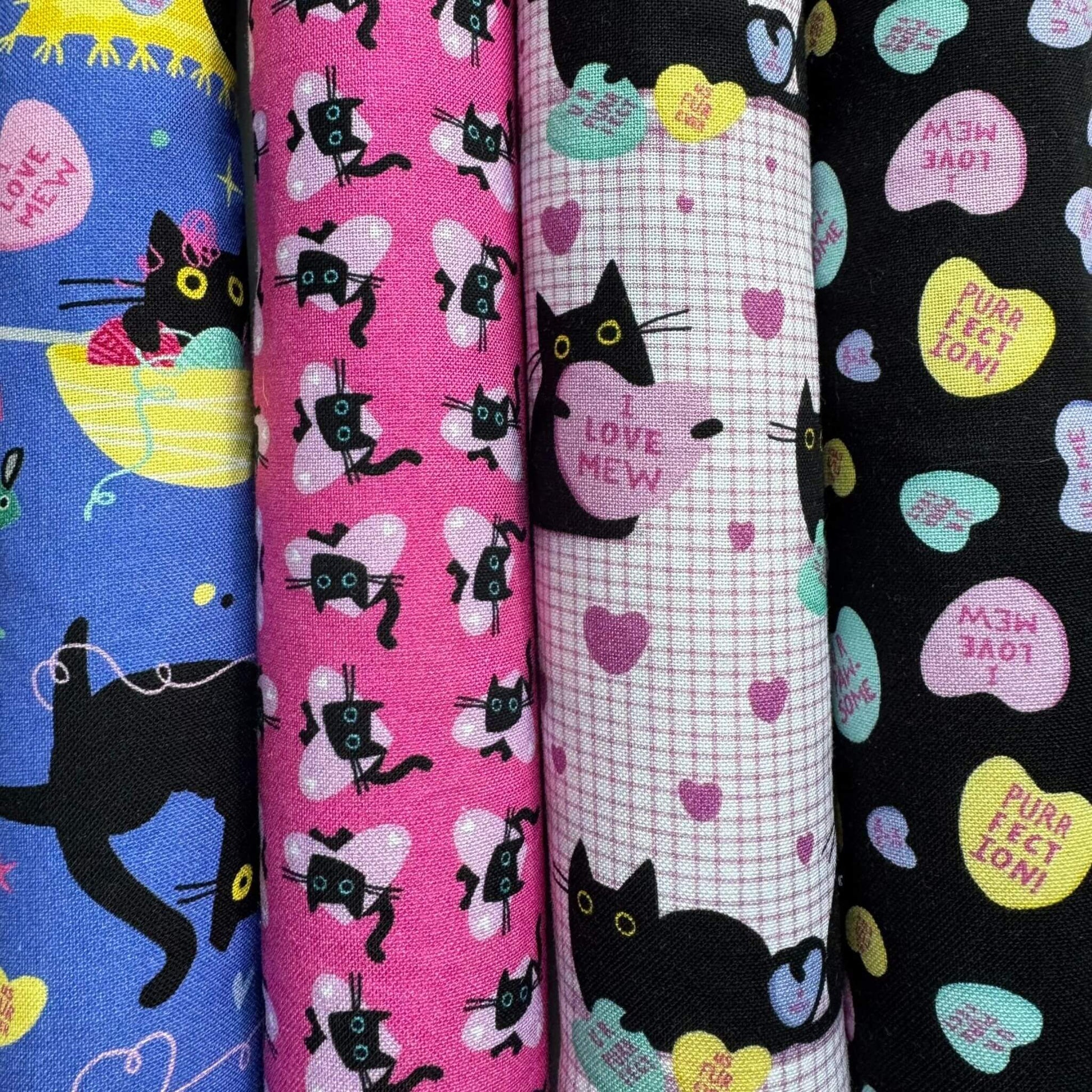 A collection of four Valentine’s-themed fabric patterns featuring black cats with whimsical designs, including hearts, wings, conversation hearts, and playful elements, used for catnip cat toys made by CatnipTakeout.