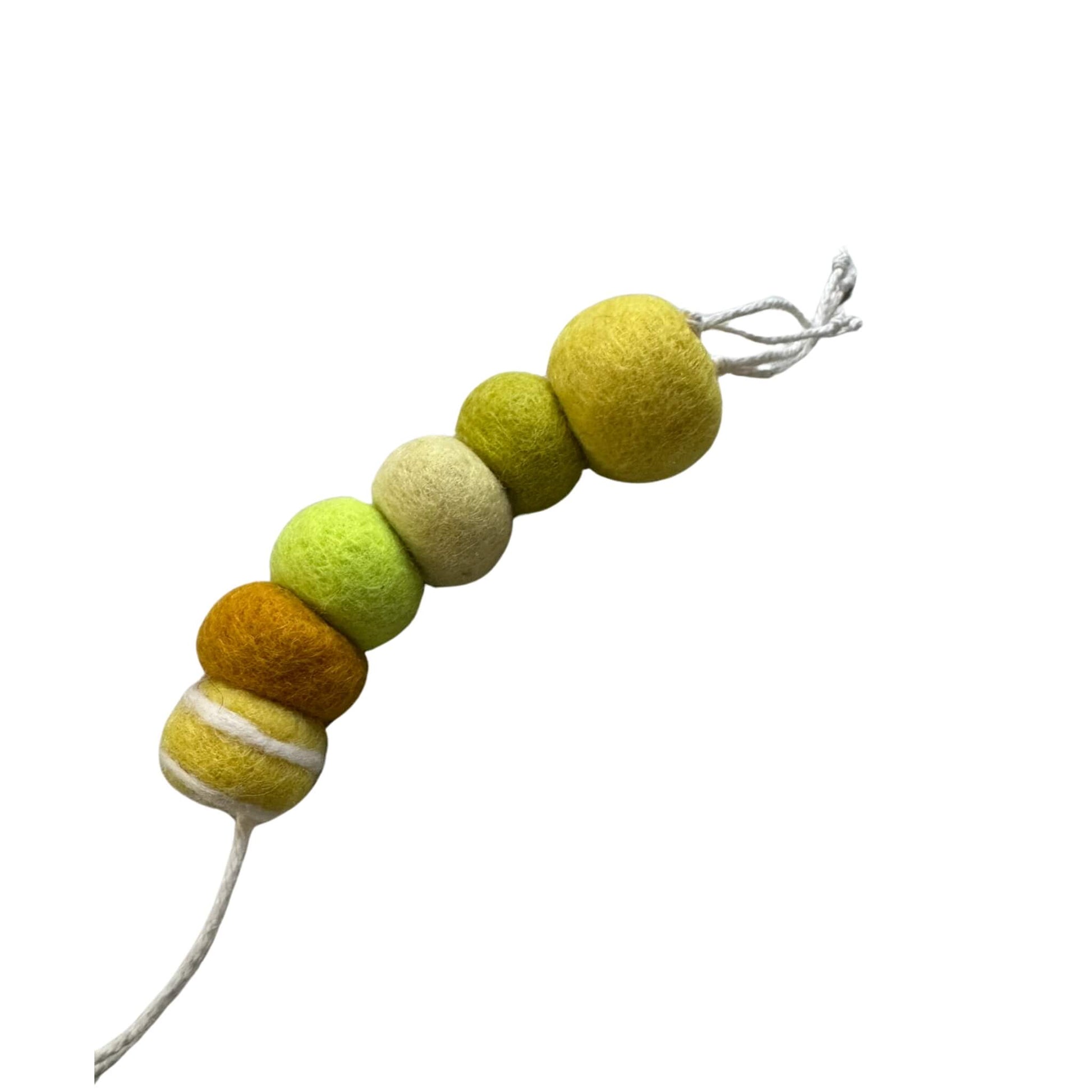 Set of wool worm cat toys in warm autumn colors, including orange, yellow, and red tones. Each toy is unique and infused with our signature fresh, aromatic premium catnip. Made by CatnipTakeout