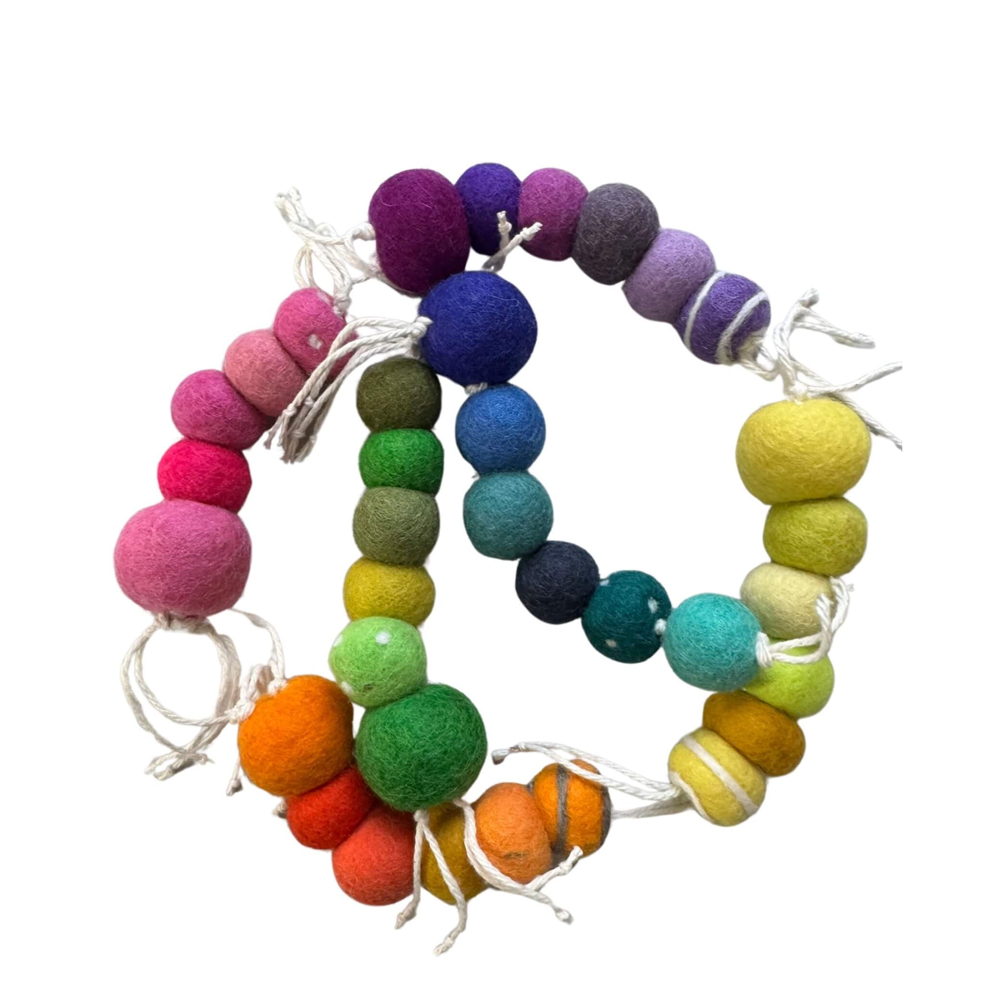 Wool worm cat toys in various color tones, each unique in design. Made from soft wool and sprayed with our signature fresh, aromatic premium catnip. Sample image shows different color options available. Made by CatnipTakeout